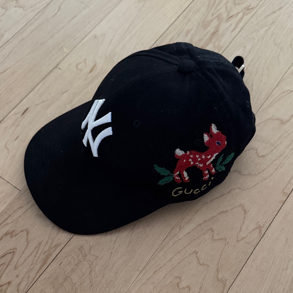 Gucci NY Black Cap with Embroidered Fawn